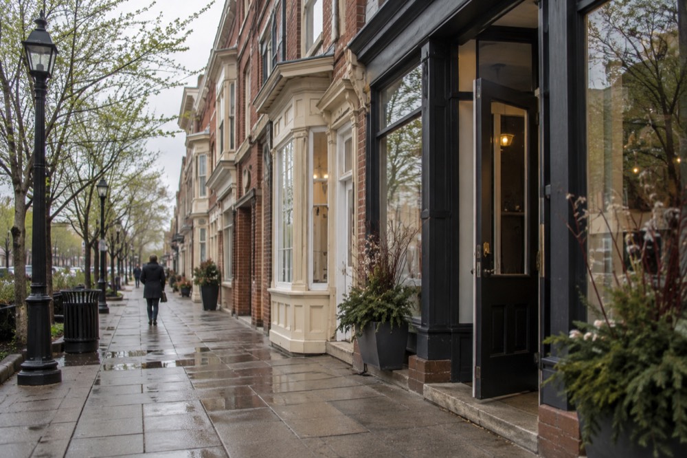 Row of historic brick and clapboard storefronts on a Charlottetown street