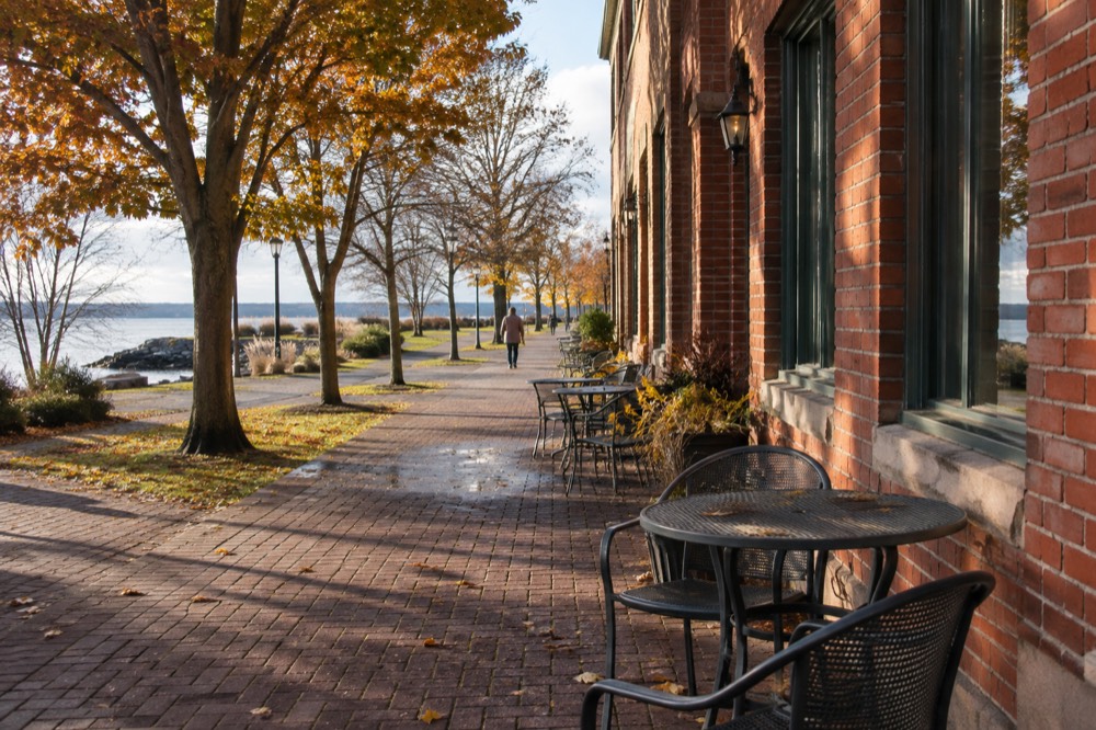 A pedestrian street in downtown Charlottetown with restaurant patios and historic storefronts