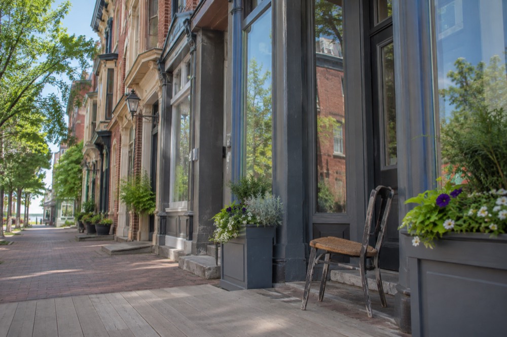 Row of colourful Victorian storefronts on a Charlottetown heritage street