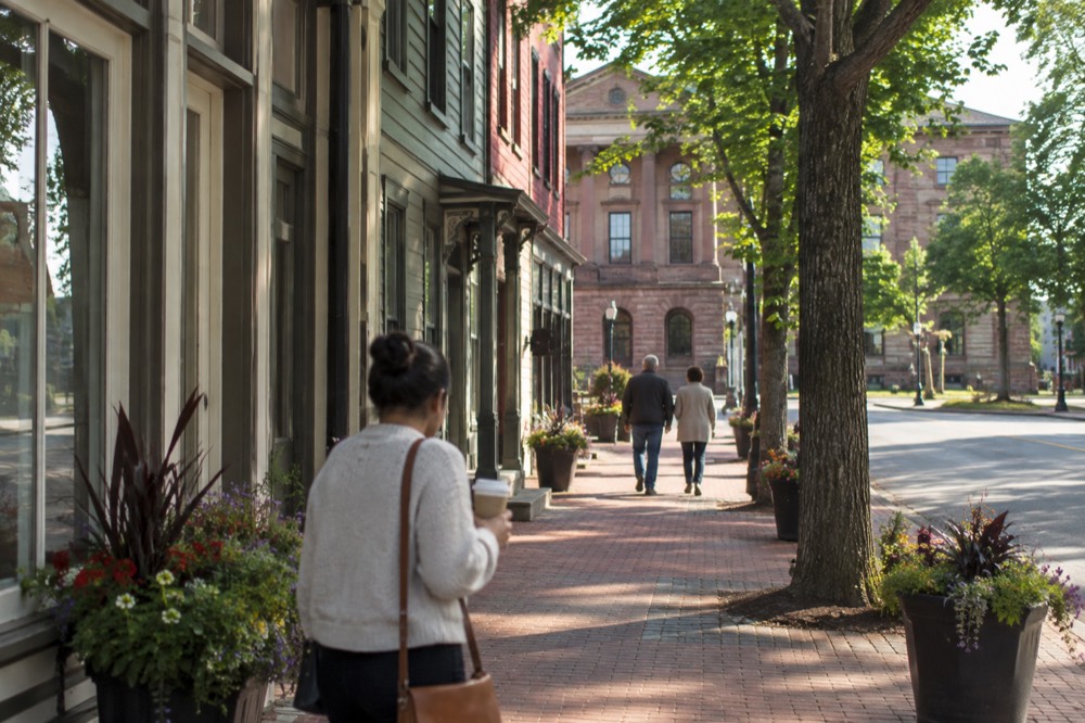Victorian storefronts along a tree-lined street in downtown Charlottetown