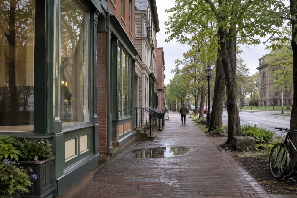 Historic brick and clapboard buildings on a Charlottetown street